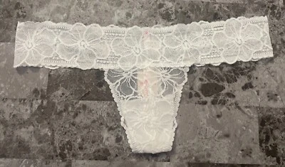 NUEVO CON ETIQUETAS BRAGAS TANGA VICTORIA'S SECRET ROSA PEQUEÑO ENCAJE FLORAL RARAS TIRO EXTRA BAJO Foto 1 de 3
