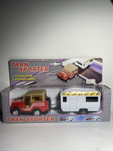 Tran Sporter RV Toy Jeep Wrangler And Towing Camper Pull Back Die-Cast Car - Foto 1 di 5
