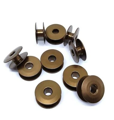 10X Bobbin (alum.), (antique brass color) #272152-AB for All Plain Sewers    - Image 1 of 3