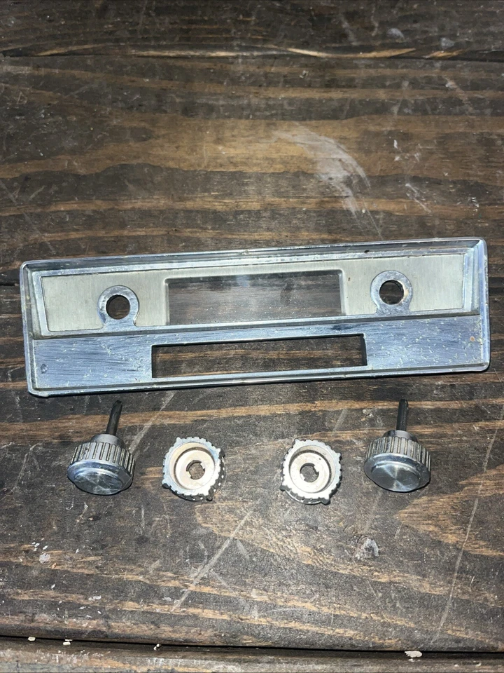 Lincoln Continental Radio 1961-1969 placa frontal cromada bisel y perillas OEM Foto 1 de 4