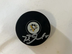 BRIAN DUMOULIN SIGNED AUTOGRAPHED PITTSBURGH PENGUINS HOCKEY PUCK - Picture 1 of 1