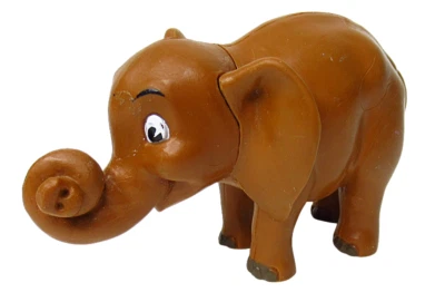 Figura de elefante de vinilo PVC marrón Boley 2001 con punta de cola amarilla de 1,75" x 3" de largo Foto 1 de 4