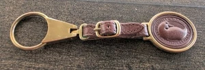 Vintage Dooney & Bourke Medaillon Schlüsselanhänger braun Leder Messing - Bild 1 von 12