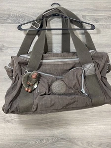 Borsa da viaggio Kipling Duffel Medium Weekender nera logo tasche cinturino Gorilla vintage - Foto 1 di 15