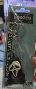 Hecho a mano por robots cara de fantasma micro vinilo clip encanto llavero brilla en la oscuridad 2024 - Imagen 1 de 2