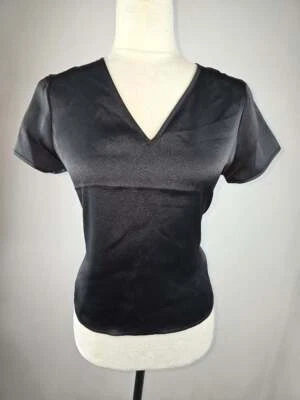 ¡NUEVO CON ETIQUETAS! Blusa/top satinado con cuello en V negro talla XS para mujer EXPRESS Foto 1 de 2