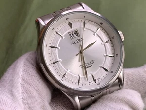 Reloj de cuarzo para hombre Alba VJ76-X021 fecha grande esfera plateada tono plateado s/s 5 atm - Imagen 1 de 15