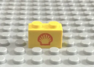 LEGO Yellow Brick 1x2 with Shell Logo Pattern - Picture 1 of 1