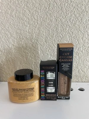 Makeup Revolution Brow Glue, Eyeshadow Base, and Baking Powder Bundle. - Image 1 of 2