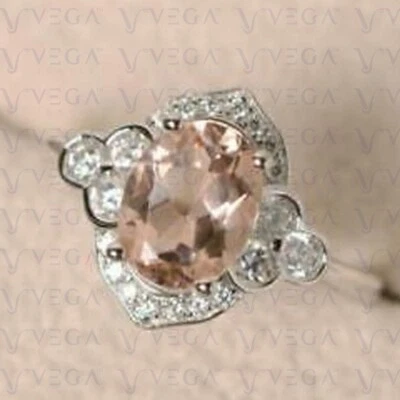 Anillo de compromiso con halo de diamantes y morganita natural de corte ovalado de 3,70 quilates de oro blanco de 14 quilates Foto 1 de 4