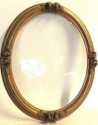 Ancien grand cadre ovale bois doré sculpté décors floraux avec vitre H 58cm - Photo 1/4