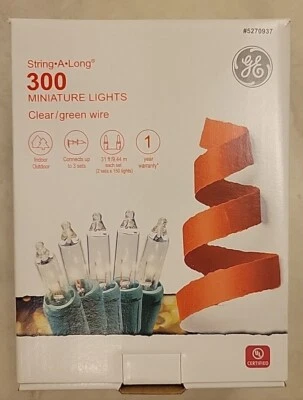 Cadena de luces de Navidad para exteriores General Electric una larga miniatura transparente 300  Foto 1 de 2