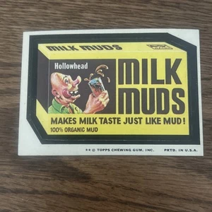 Topps Wacky Packages Milk Muds 1975 serie 12 pegatina trasera bronceada casi nueva - Imagen 1 de 5