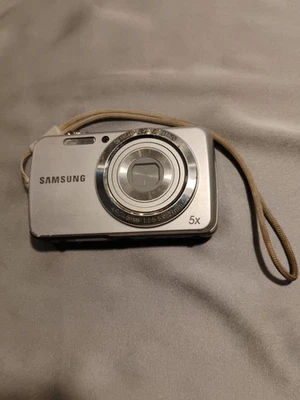 Cámara digital Samsung serie PL20 14,2 MP - plateada  Foto 1 de 4