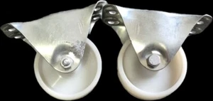 2 RUOTE IN TEFLON BIANCO C/PIASTRA ACCIAIO ZINCATO DA H.CM10 RICAMBIO CARRELLI - Foto 1 di 2