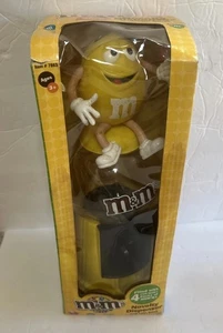 M&M Novelty Dispenser and Coin Bank Yellow Holding Rose 2008 - Picture 1 of 6