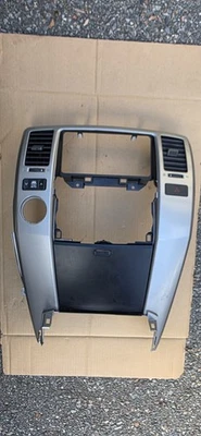 Toyota 4Runner 2003-2009 tablero central radio bisel 4x4 plateado genuino OEM Foto 1 de 4