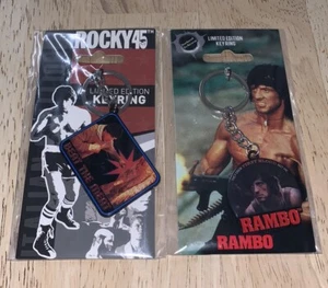 Sylvester Stallone Rocky And Rambo First Blood 2 Keychain Set Keyring Fanattik - Foto 1 di 2