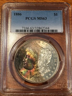 Моргановский доллар 1886 г. — тонированный PCGS MS 63! - Высококачественные сканы #2344 - Изображение 1 из 4
