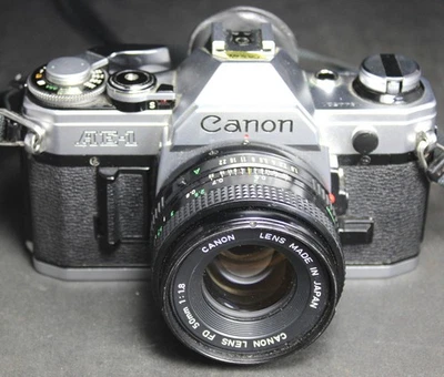 Canon AE-1 analoge Spiegelreflexkamera 35 mm mit FD 50 mm f:1,8 Objektiv – funktioniert - Bild 1 von 4