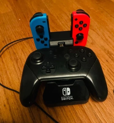 Nintendo Switch OLED accessories bundle, plus 5 games - Image 1 of 4