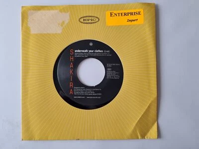 Шакира - под вашей одеждой 7'' винил США - Изображение 1 из 4