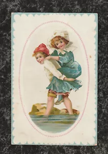 Victorian Era Stock Trade Card Boy Piggybacks Girl Through Water 5.5 x 3.5 - Bild 1 von 2