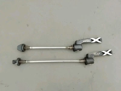 Shimano Xtr M975 Spiedini QR Ruota Bici 100mm 135mm - Immagine 1 di 4