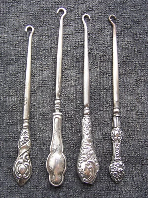 Cuatro ganchos de botón vintage de principios del siglo XX en plata de ley y chapado (AAJ) Foto 1 de 4