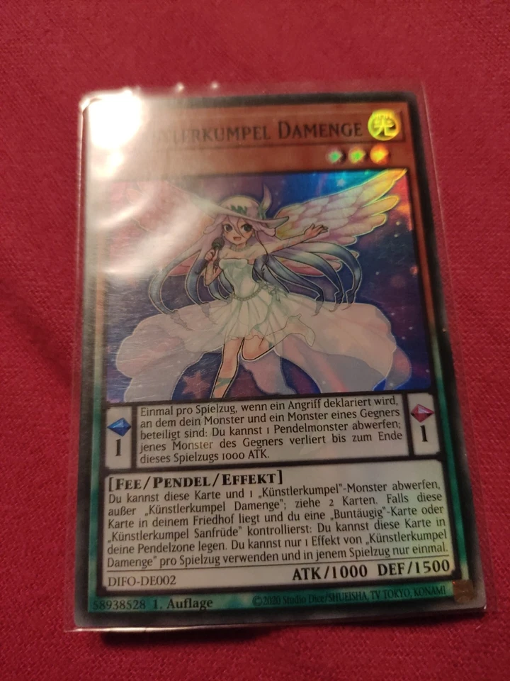 YU GI OH KÜNSTLERKUMPEL DAMENGE  DIFO-DE002 SUPER RARE 1.AUFLAGE - Bild 1 von 1