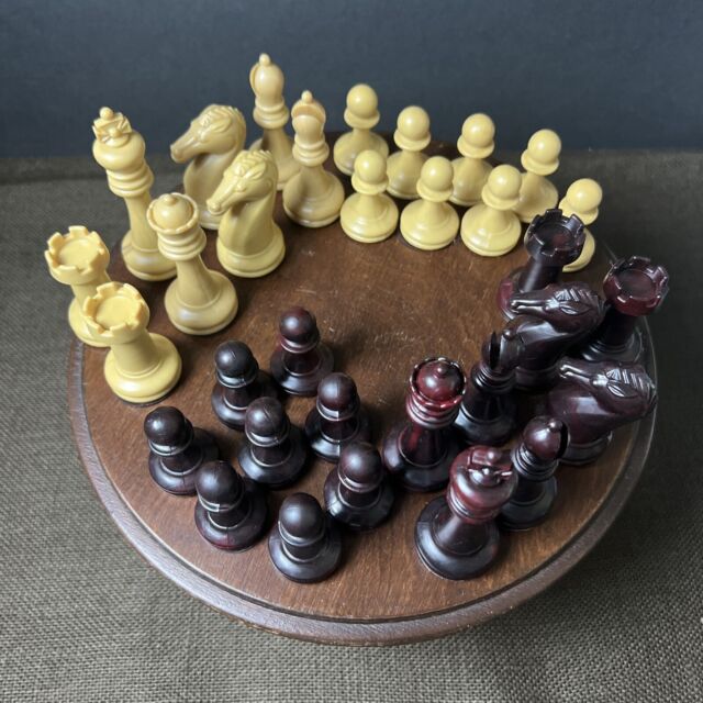 Chess pieces: 32 red and white ivory pieces without board., Complete number  of pieces of a chess game. Sixteen cut ivory pieces that have been made red  with a dyestuff: these are