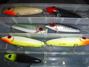 7 BOMBER and MIRRO LURE TOP WATER LURES AND CASE - Picture 1 of 2