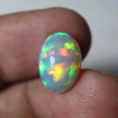 10x14 MM Oval 3 Cts Natural Top Grade Multi Fire White Ethiopian Opal Cabochon - Image 1 of 4