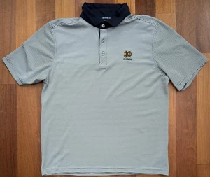 Polo Cutter & Buck Notre Dame Lucha Alumnos Irlandeses a Rayas Talla Para Hombre MEDIANO - Imagen 1 de 6