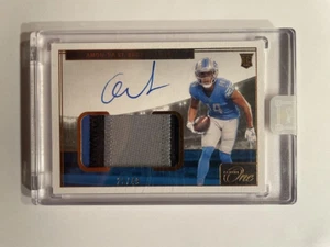 Panini One Amon-Ra St. Brown 2021 #23/49 parche de novato automático RPA #26 Detroit Lions - Imagen 1 de 2