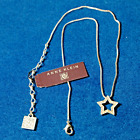 Anne Klein rhinestone star pendant necklace on silver toned delicate chain