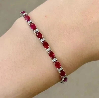 Brazalete de tenis de diamantes rubí rojo creado en laboratorio de corte ovalado de 7 quilates enchapado en oro blanco de 14 quilates Foto 1 de 4
