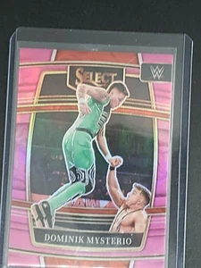 Panini Select WWE 2022 - Concourse Dominik Mysterio #17 Pink Prizm/49 - Imagen 1 de 3