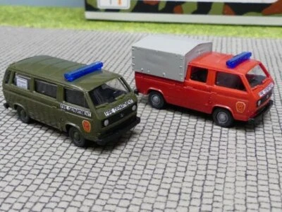 1/87 Roco VW T3 US Army Feuerwehr Bus + VW T3 DoKa 597 - Bild 1 von 2