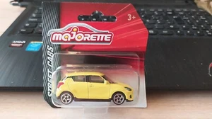 MAJORETTE - SUZUKI SWIFT SPORT AMARILLO 1/64 APROX *NUEVO* - Imagen 1 de 3