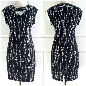 Abito donna nuovo senza etichette Voodoo Vixen nero bianco floreale pinup midi tg M dettaglio bottoni - Foto 1 di 6