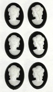 12 Vintage Resin Kameen 18 x 13 mm nach links & rechts gerichtet elfenbein auf schwarz SET NEU - Bild 1 von 2