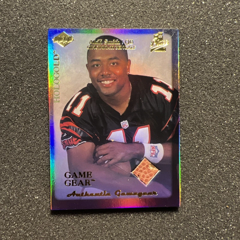 1999 Collectors Edge AKILI SMITH #RG3 Game Gear HOLOGOLD - GAME BALL 1st PLACE B - Image 1 of 4