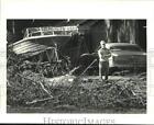 1987 Press Photo Gene Jackson looks at trees cleared next to his land- Chalmette