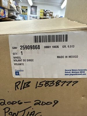 Volante GM 25909868 envuelto en cuero ébano 2006-09 Pontiac Torrent Nuevo de Lote Antiguo Foto 1 de 4