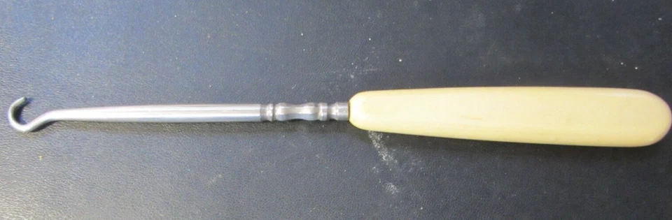 Gancho de botão celulóide art déco prata marfim colecionável vitoriano antigo - Imagem 1 de 4