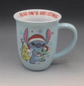 DISNEY LILO & STITCH CHRISTMAS COFFEE OR TEA MUG SANTA TREE LIGHT BLUE 16 FL.OZ - Picture 1 of 7