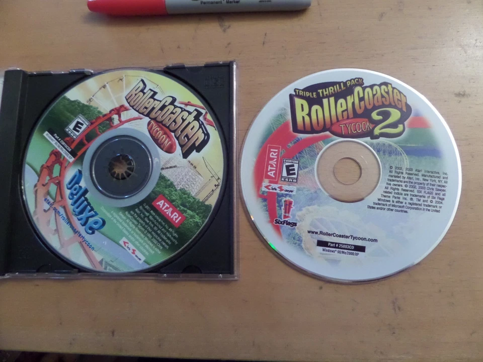 Rollercoaster Tycoon 2 Triple Thrill Pack & Rollercoaster Tycoon Deluxe PCCD - Image 1 of 1