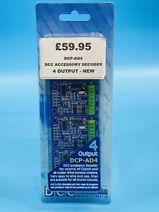 DCC CONCEPT DCP-AD4 DCC ACCESSORY DECODER 4 OUTPUT NEW ! - Picture 1 of 1