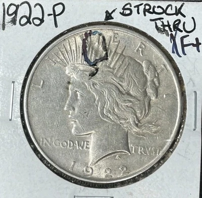 1922 PEACE SILVER DOLLAR ~ XF+ STRUCK THRU ERROR ~NICE COIN~ - Image 1 of 2